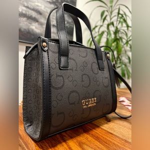 GUESS black little hand bag,  super cute for going out goes with everything